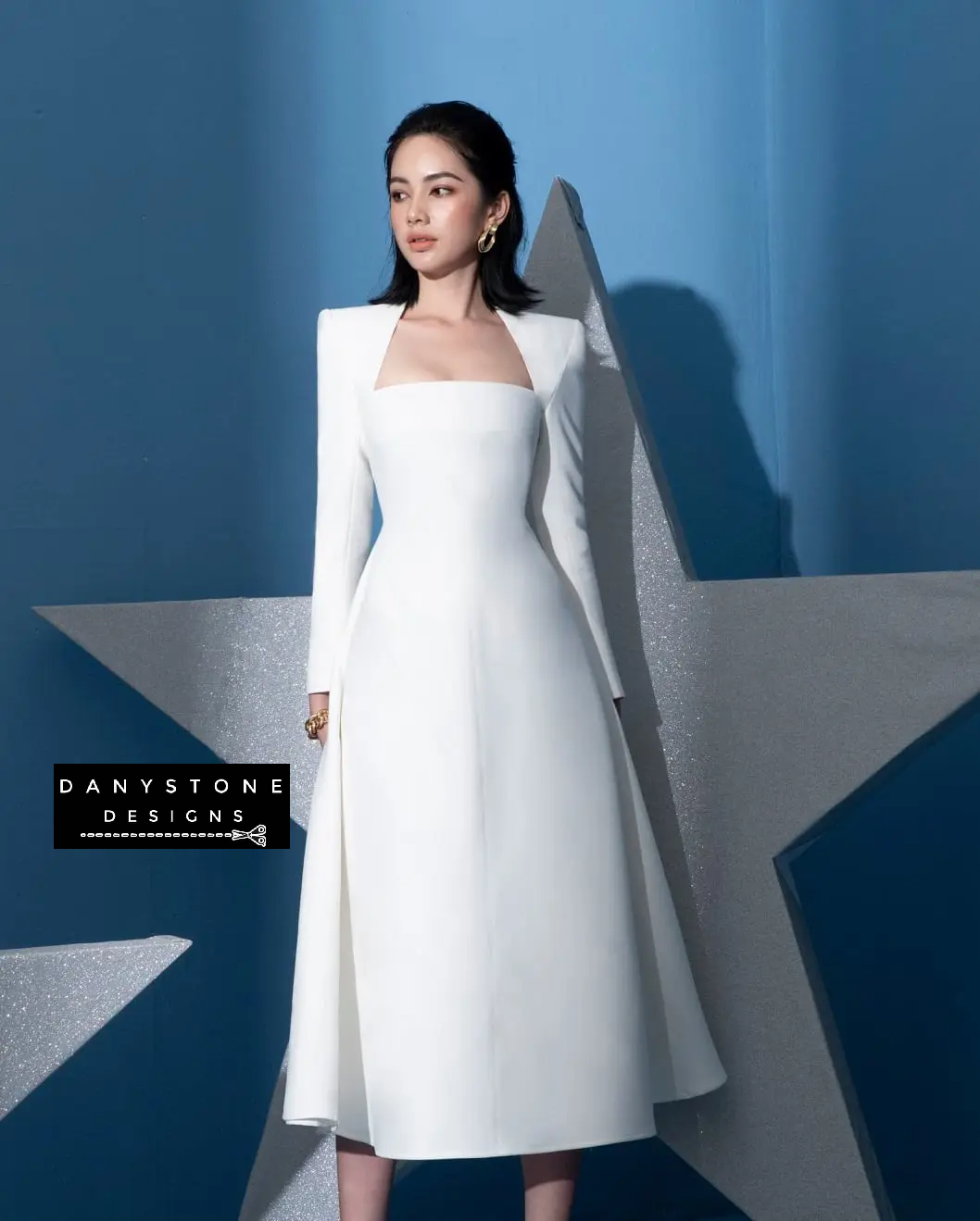 View of White Long Sleeve Flared Dress Highlighting Flared Skirt