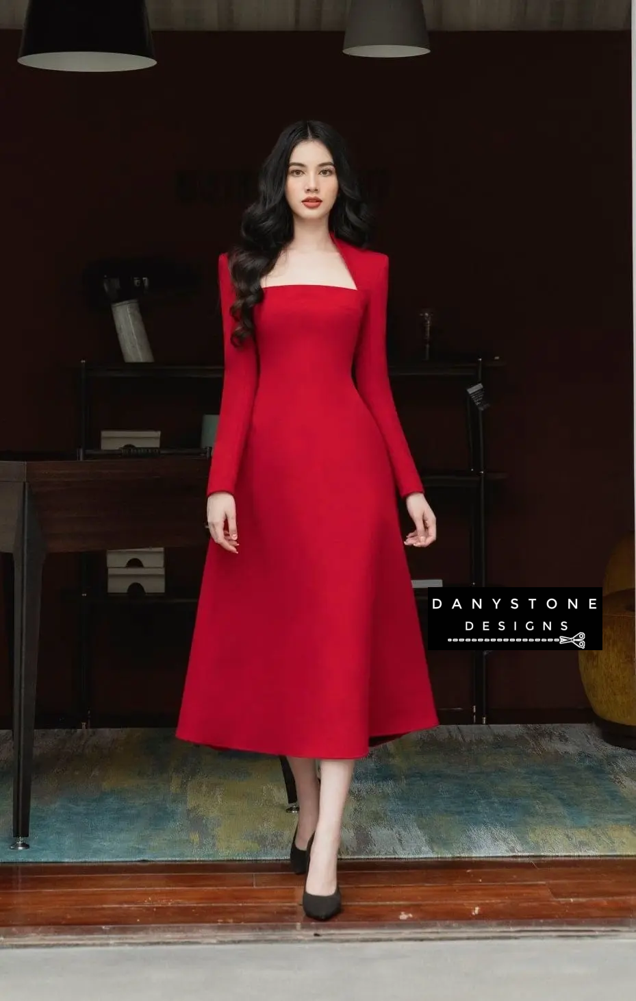 Model Wearing Red Long Sleeve Flared Dress in Stylish Setting