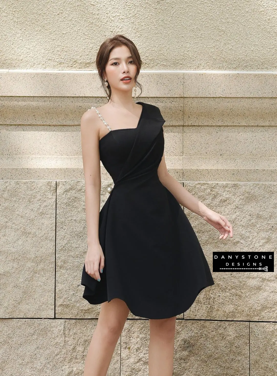 Front View of Black Flared Dress Emphasizing Classic Design and Fit