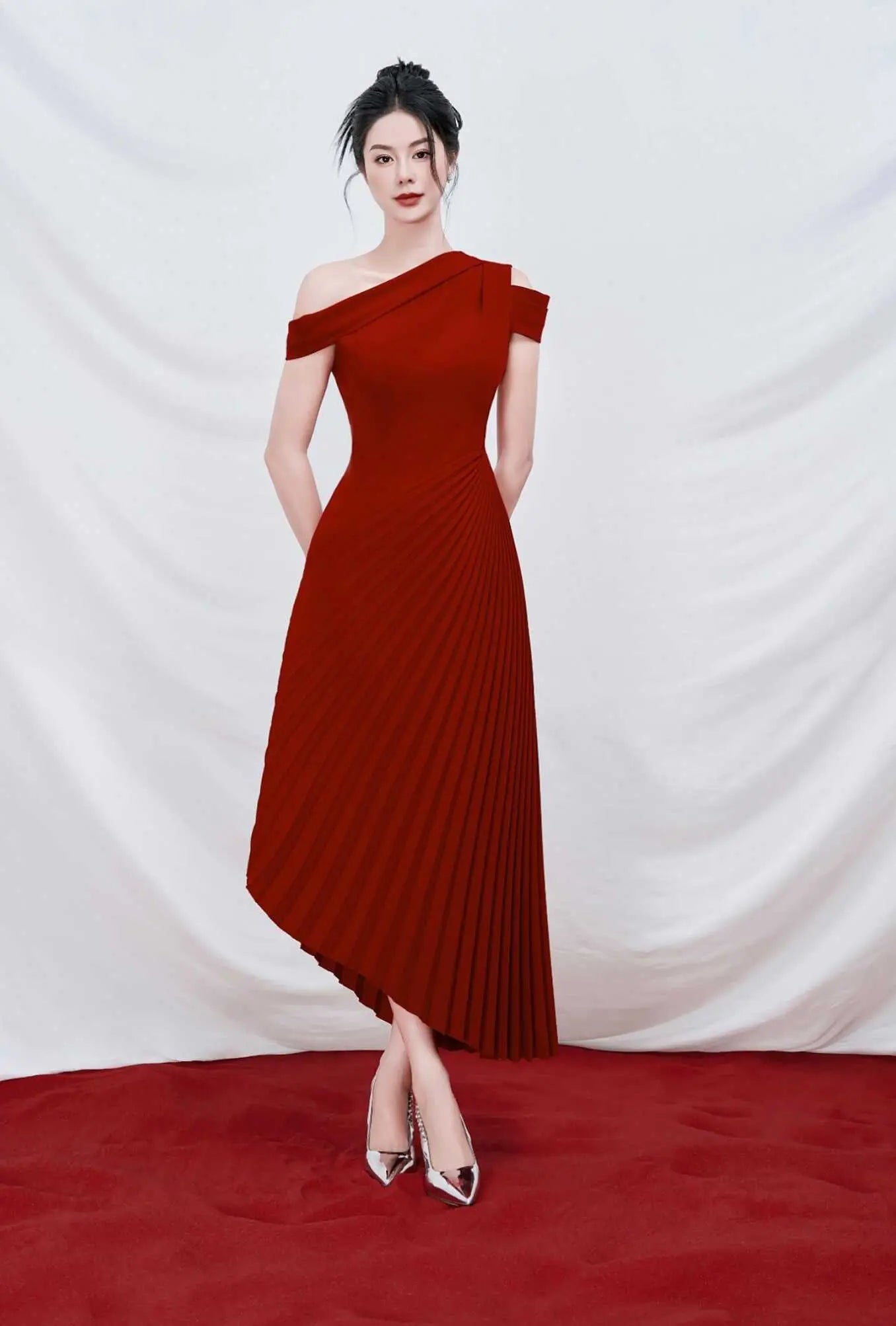 Elegant red off-shoulder pleated dress front view