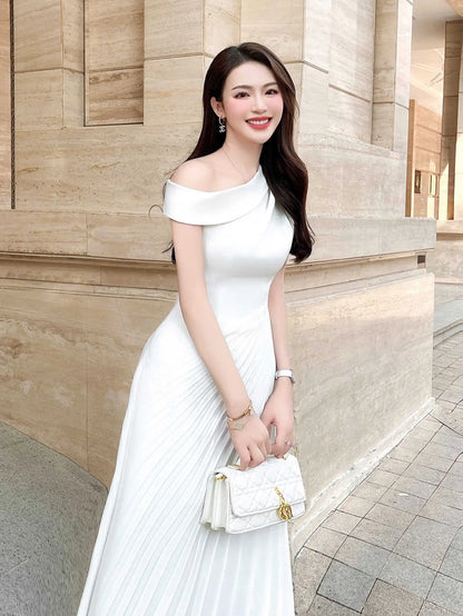 Stylish white pleated dress side profile