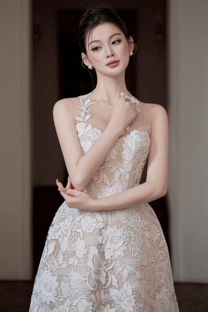 Woman wearing a lace dress with a blurred background