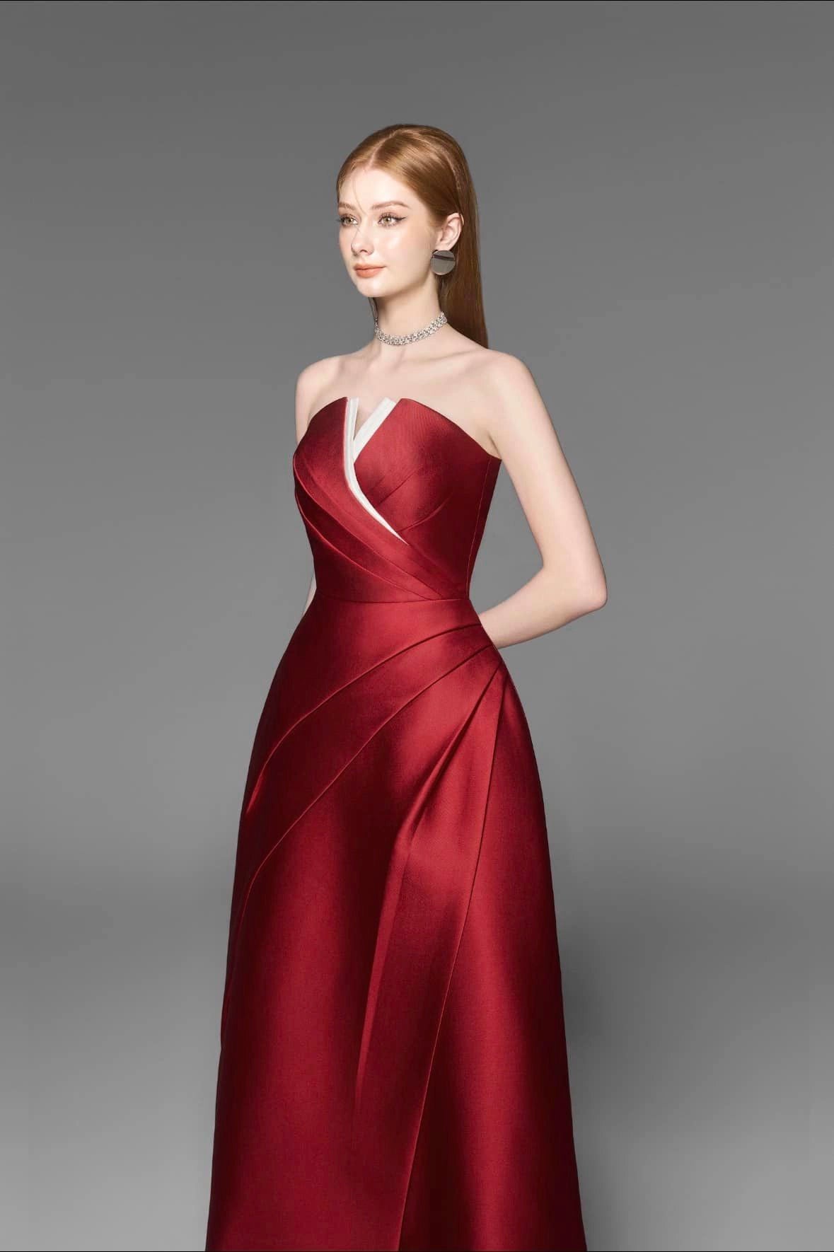 Luxurious red strapless pleated dress front view