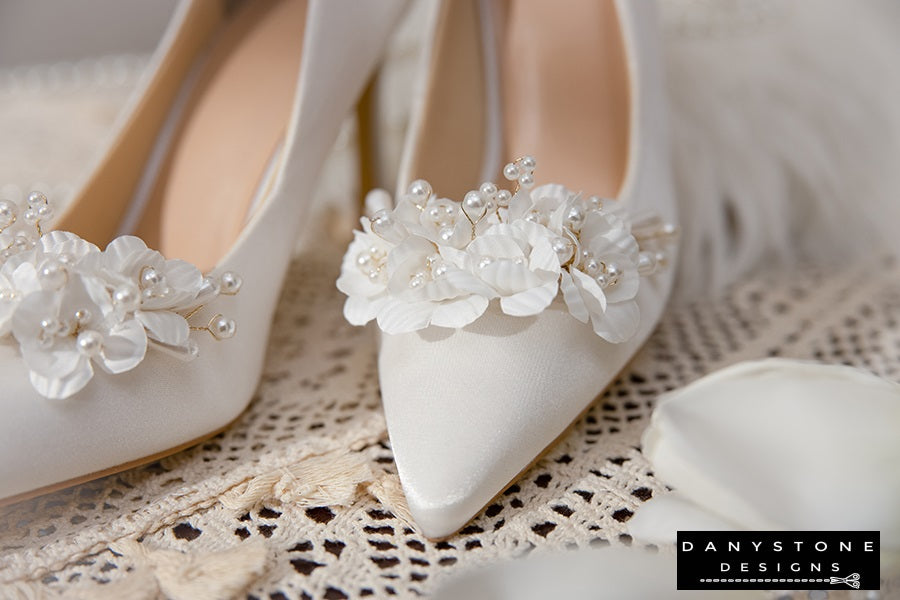 Elegant White Silk Satin Wedding Heel with floral design, displayed with a white tulip in the background.