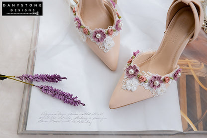 Nude wedding shoes with floral lace details and 9cm heel, showcased with elegant accessories.