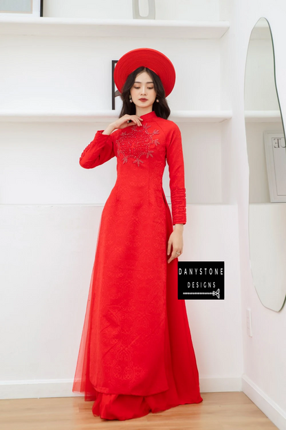 Full-length view of a bride wearing the Royal Brocade Beaded Bridal Ao Dai, highlighting the luxurious brocade fabric and beaded accents.