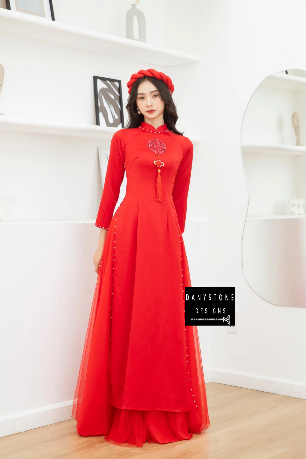 Full-length view of a bride in the Bright Red Silk Wedding Ao Dai, emphasizing the soft, smooth fabric and meticulous seams.