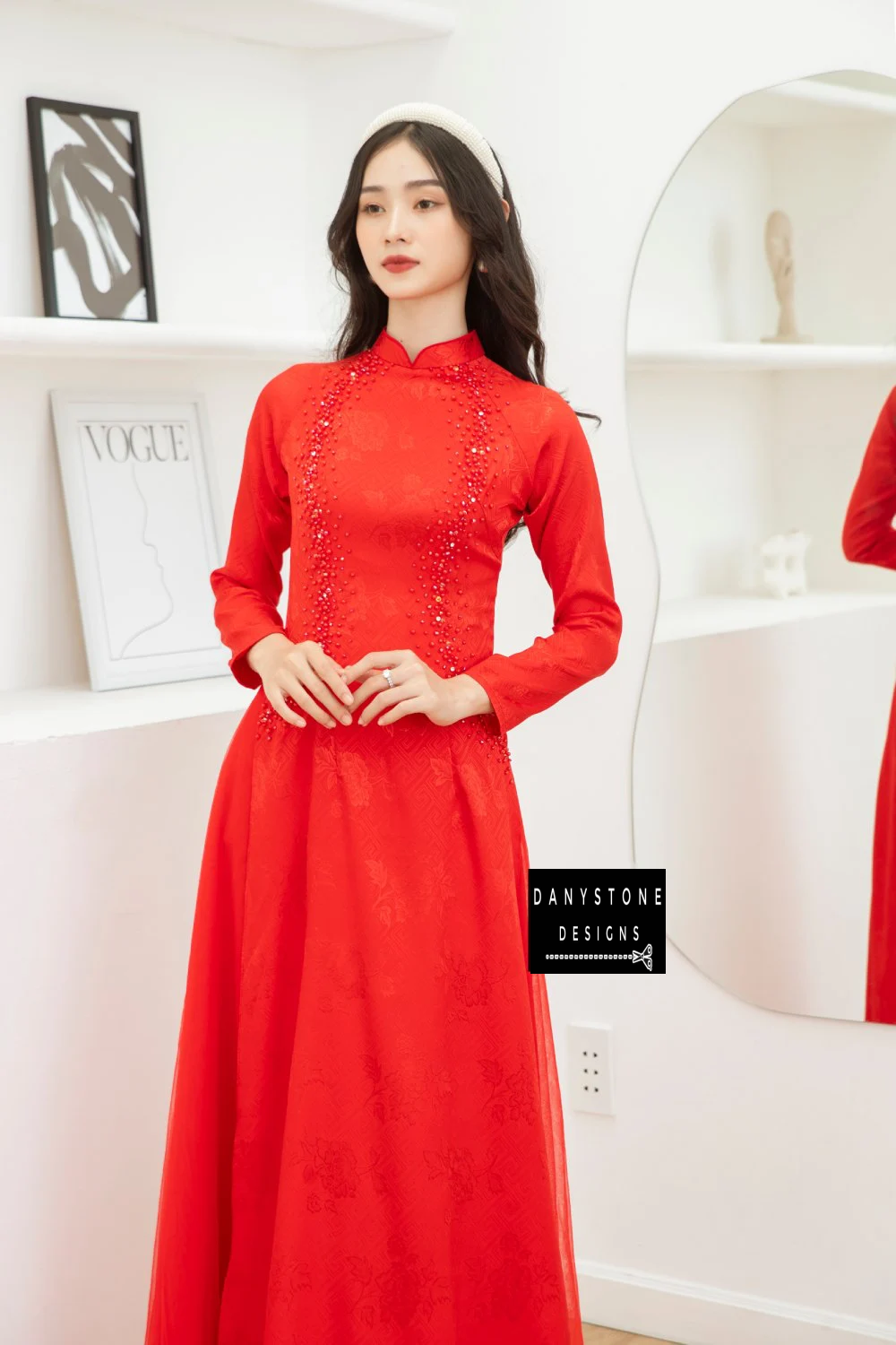 Side view of the Red Brocade Bridal Ao Dai, capturing the elegant pearl details and soft brocade fabric.