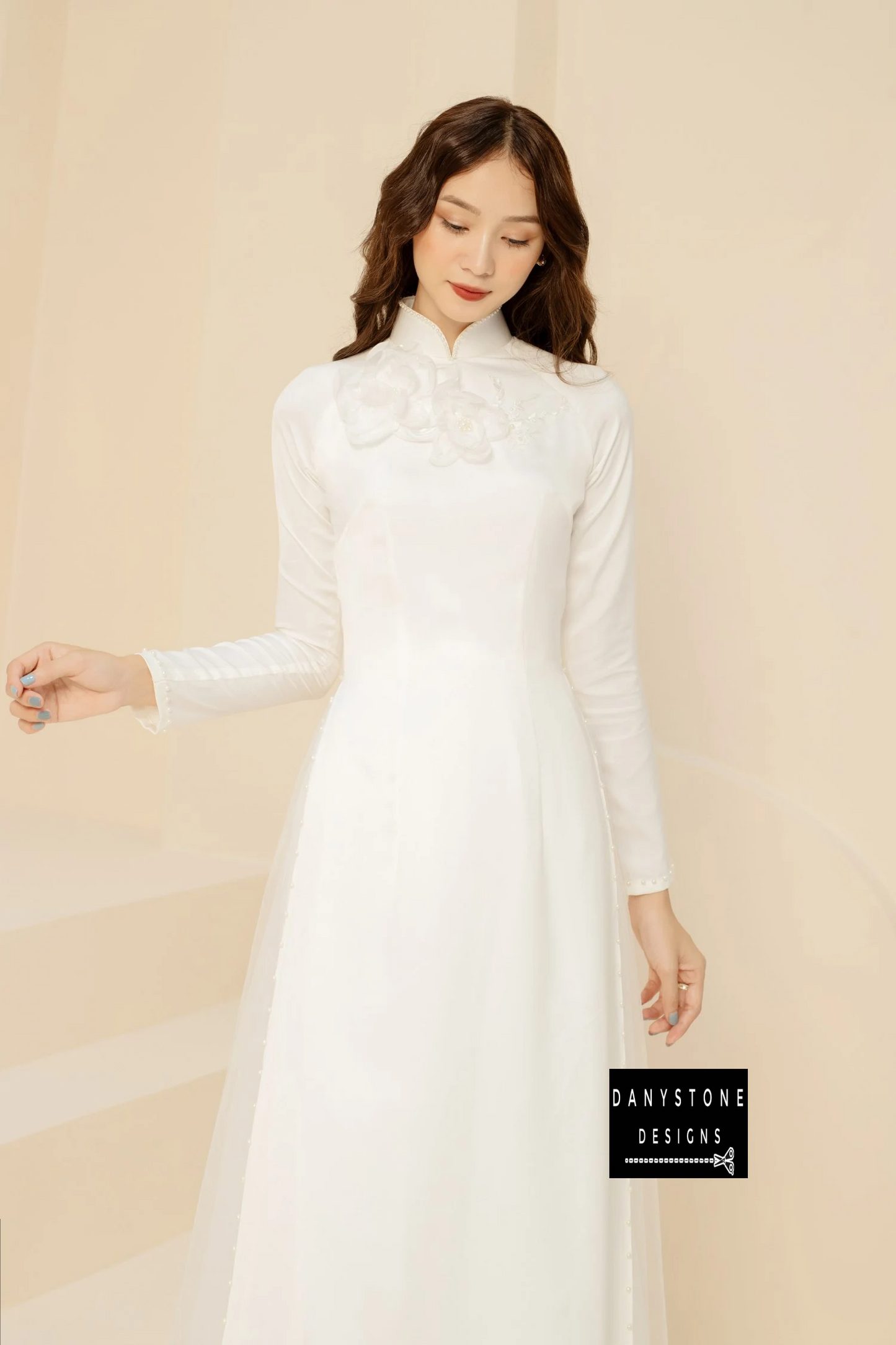 Full-length view of the White Silk Bridal Ao Dai, capturing the graceful flow and elegant design.