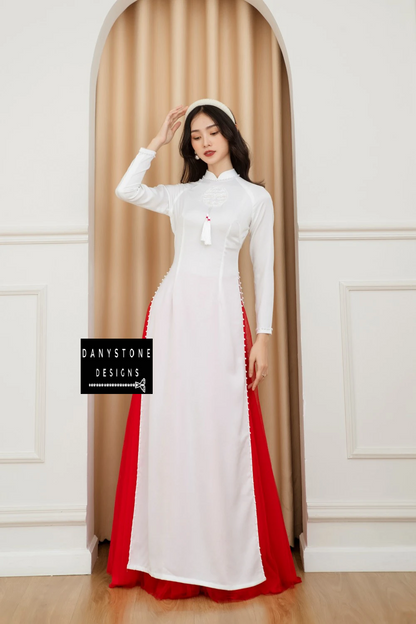 Full-length view of a bride wearing the Elegant White Silk Wedding Ao Dai, standing gracefully with a soft background.