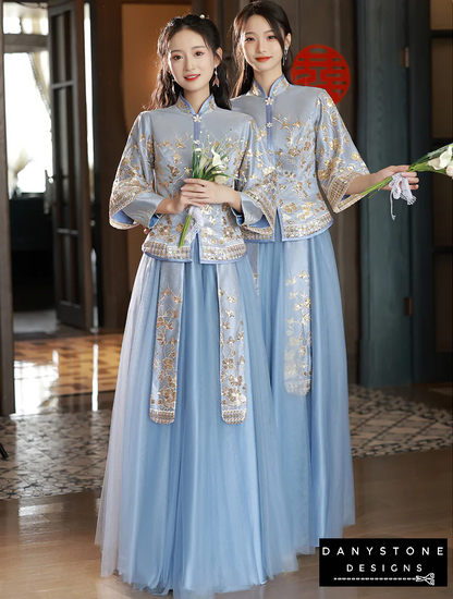 Two women wearing Elegant Blue Chinese Traditional Wedding Dress with Intricate Embroidery