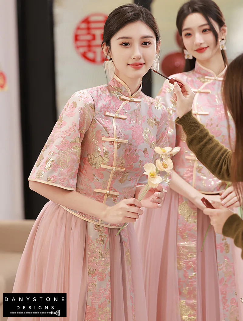 "Two women wearing Elegant Pink Chinese Style Bridesmaids Dress with Intricate Embroidery"