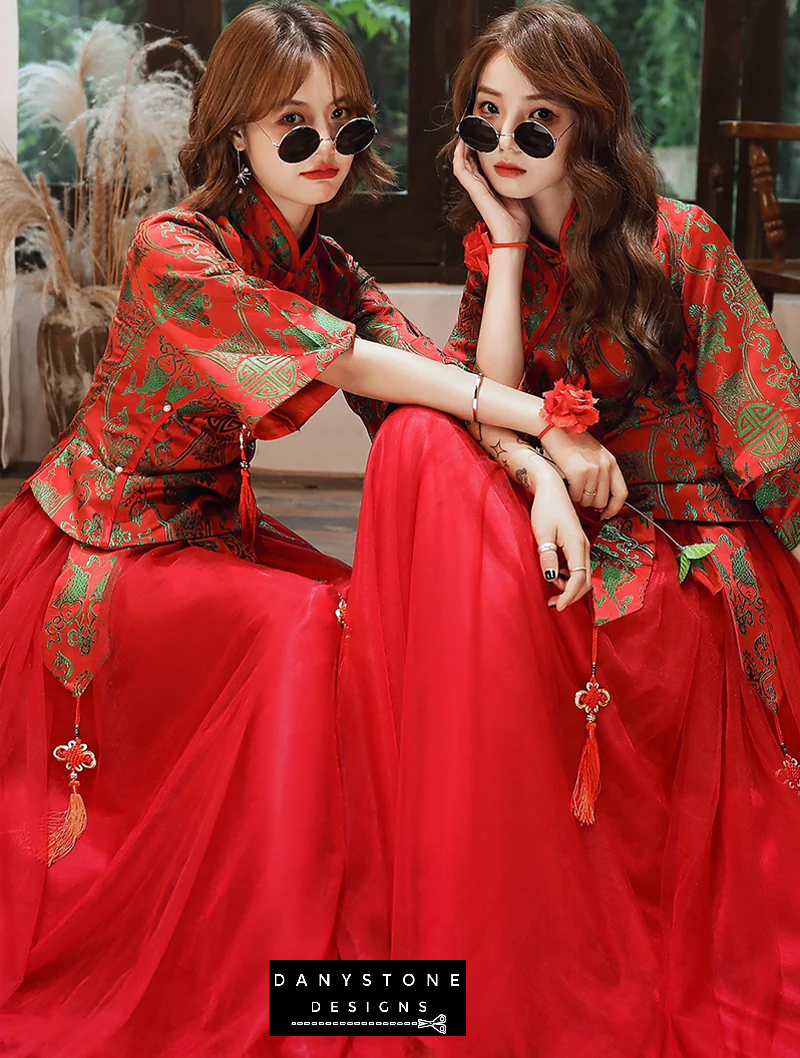 "Model wearing a red and green embroidered gown, showcasing the tailored fit"