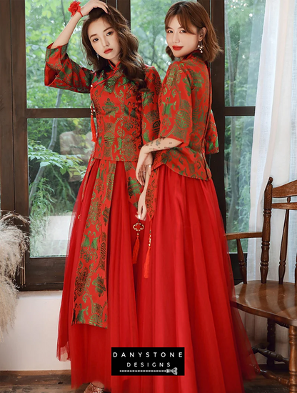 "Two models in traditional red gowns, emphasizing the rich color and detailing"