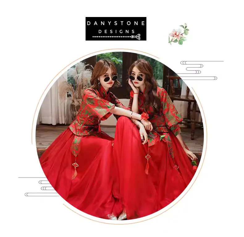 "Elegant red gown with green embroidery, perfect for weddings and special occasions"