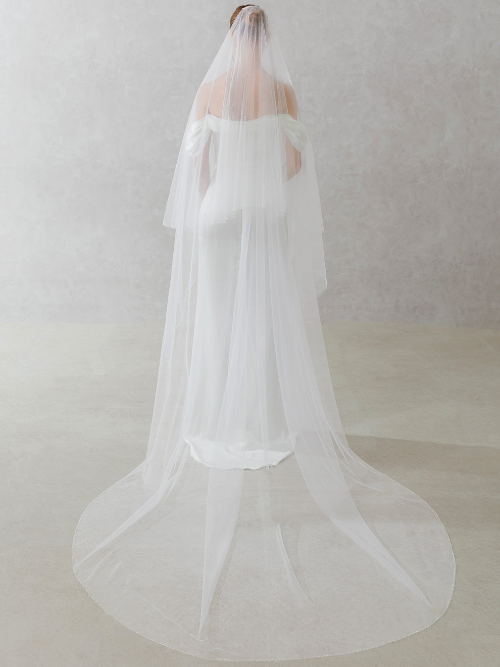 White wedding veil on a neutral background