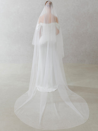 White wedding veil on a neutral background