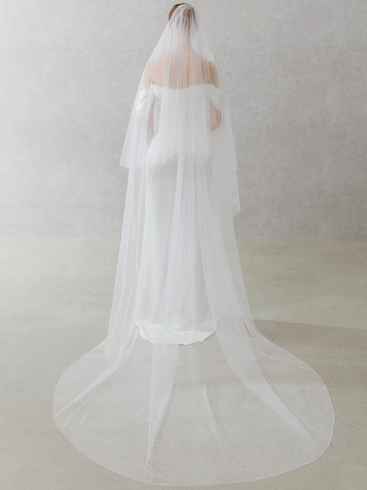 White wedding veil on a neutral background