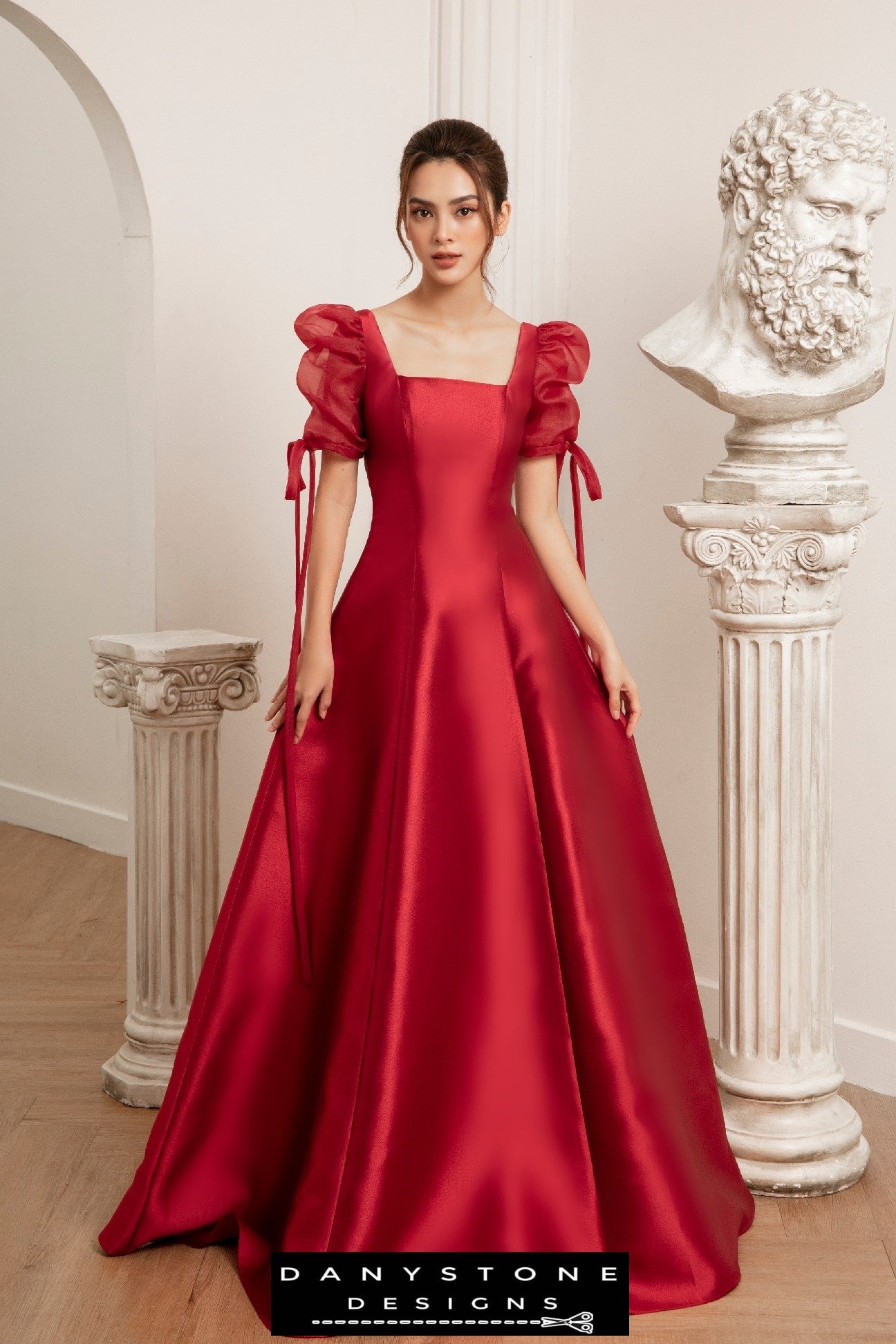 Elegant seven-piece red wedding dress with detailed silk chiffon sleeves