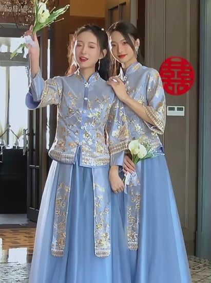 Two women wearing Elegant Blue Chinese Traditional Wedding Dress with Intricate Embroidery