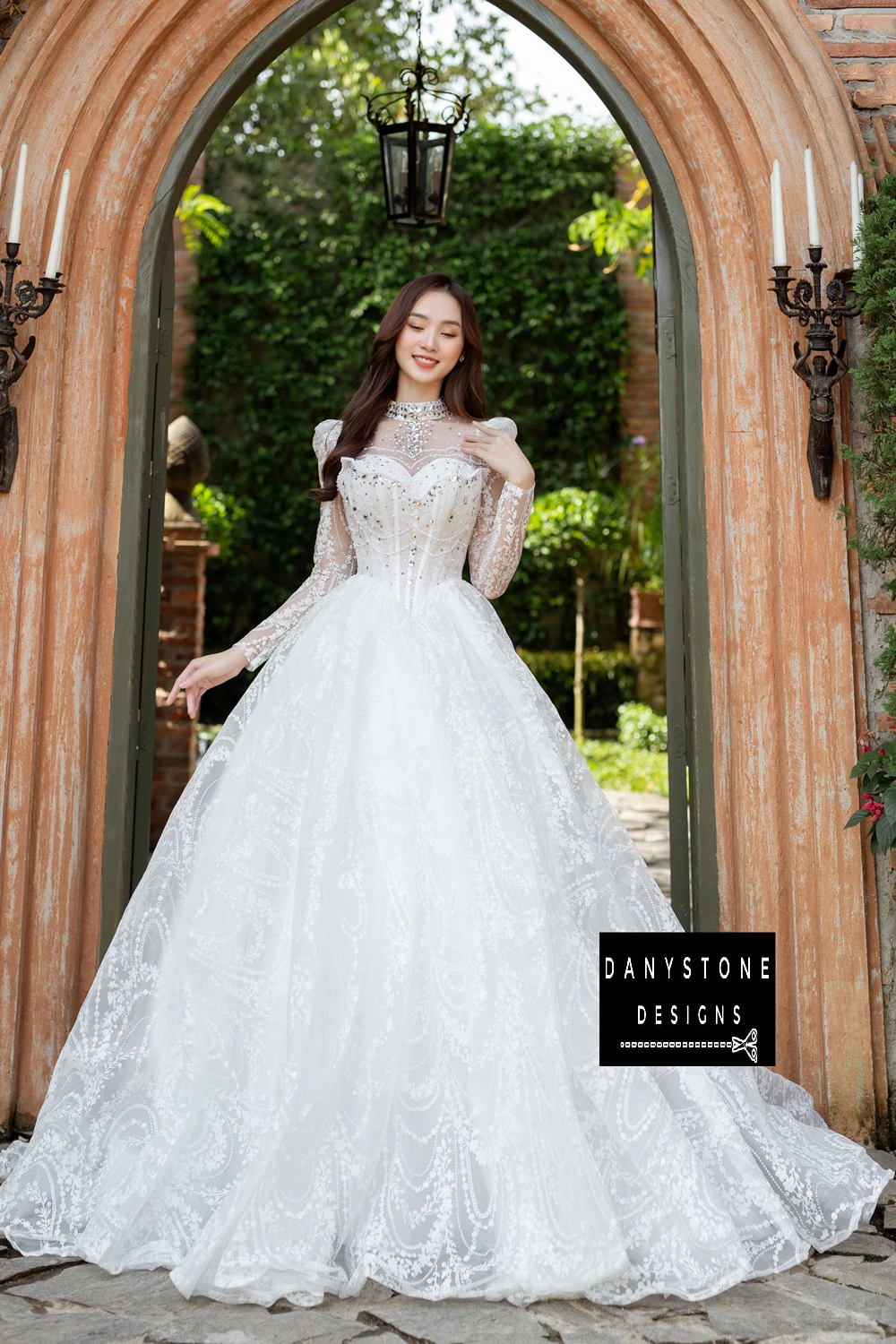 "Full-length view of Royal Floral Lace Wedding Dress with see-through lace sleeves"